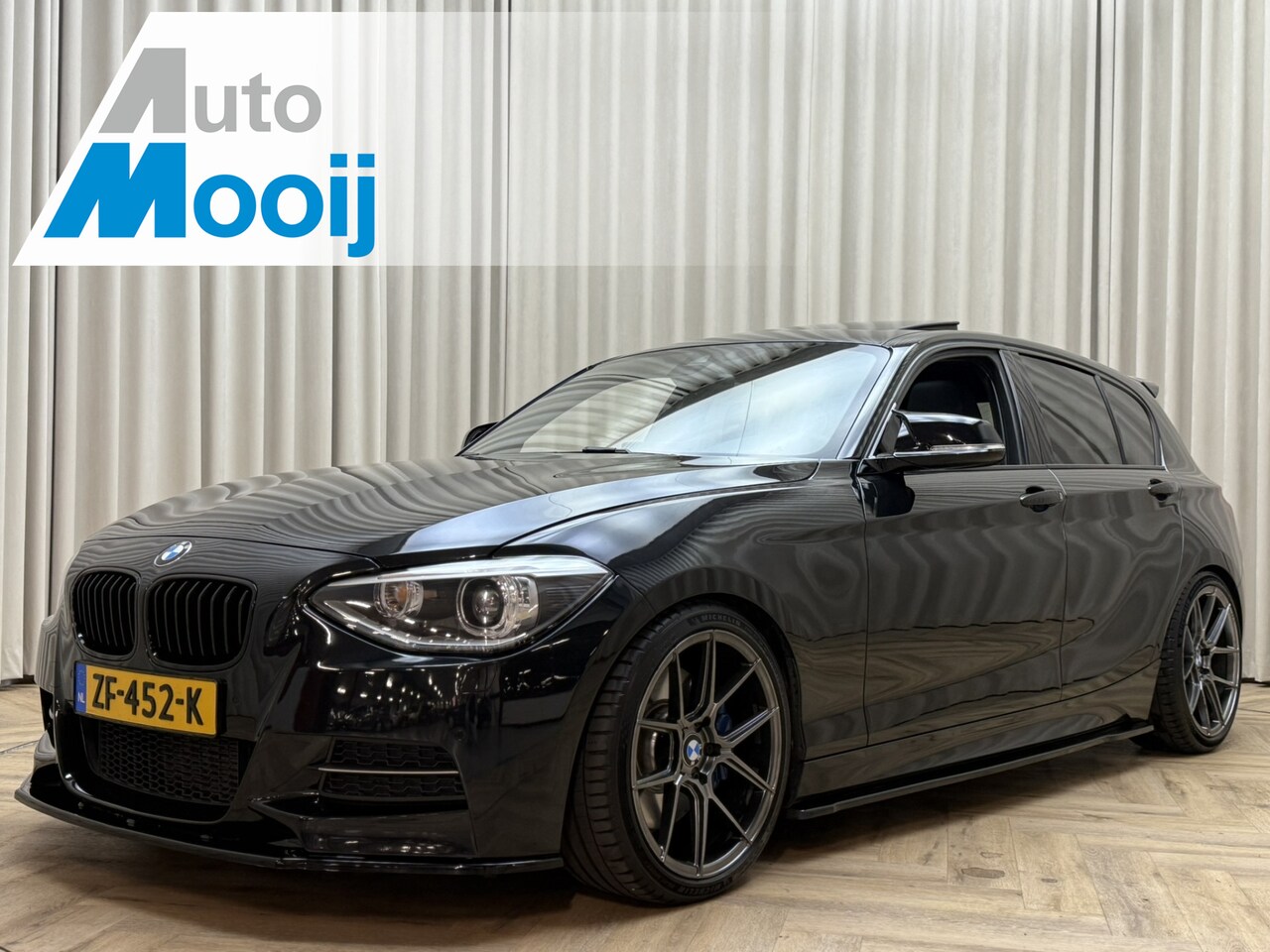 BMW 1-serie - M135i / M-Performance / 320 PK / F1 Sportautomaat / HK Audio / Schuifdak / Leder / Navi Pr - AutoWereld.nl