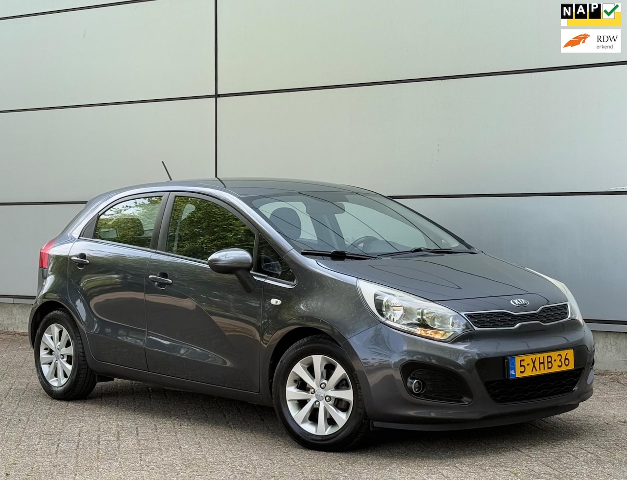 Kia Rio - 1.2 CVVT BusinessLine Airco |Cruise |Stuurbed |Lmv |Nederlandse Auto |Boekjes - AutoWereld.nl