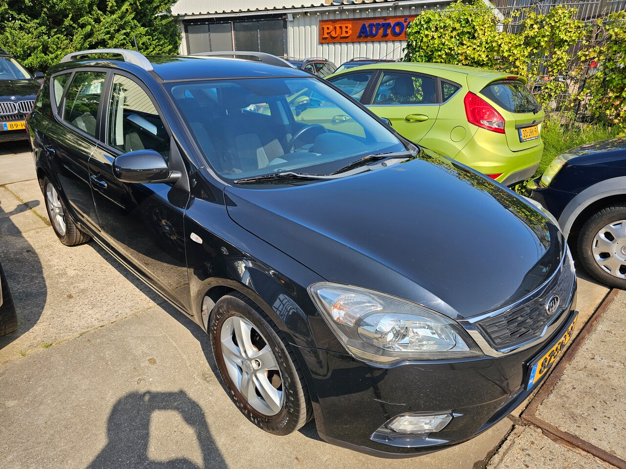 Kia Cee'd Sporty Wagon - 1.4 CVVT Navigator Plus Pack - AutoWereld.nl