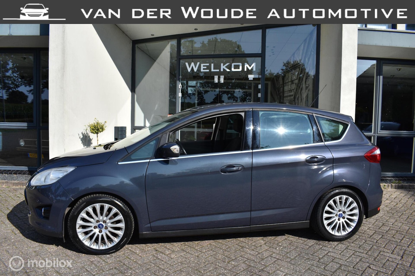 Ford C-Max - 1.0 Titanium 2014|Clima|Cruise|Navi|Camera - AutoWereld.nl