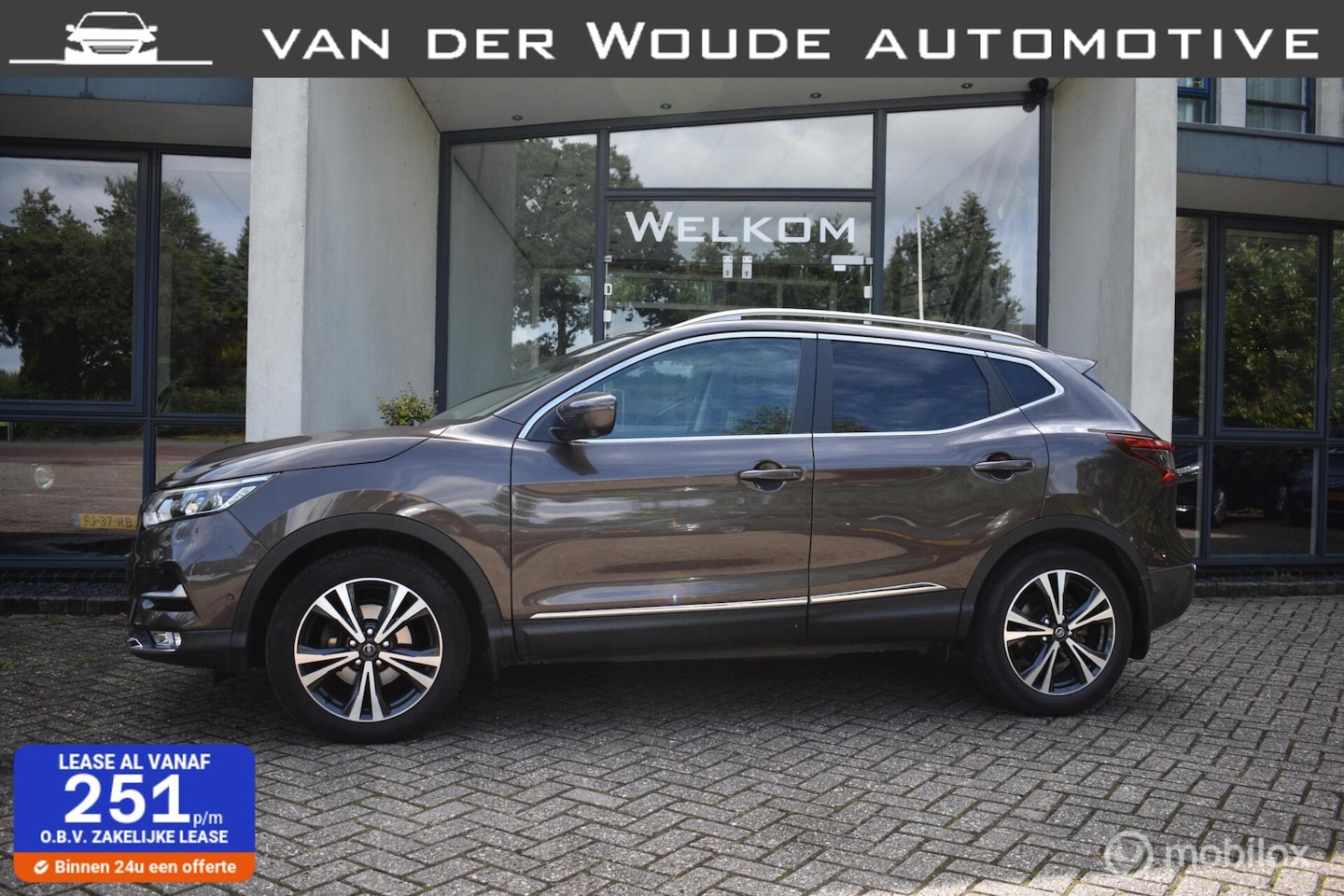 Nissan Qashqai - 1.2 Tekna + LEER TREKHAAK LED - AutoWereld.nl