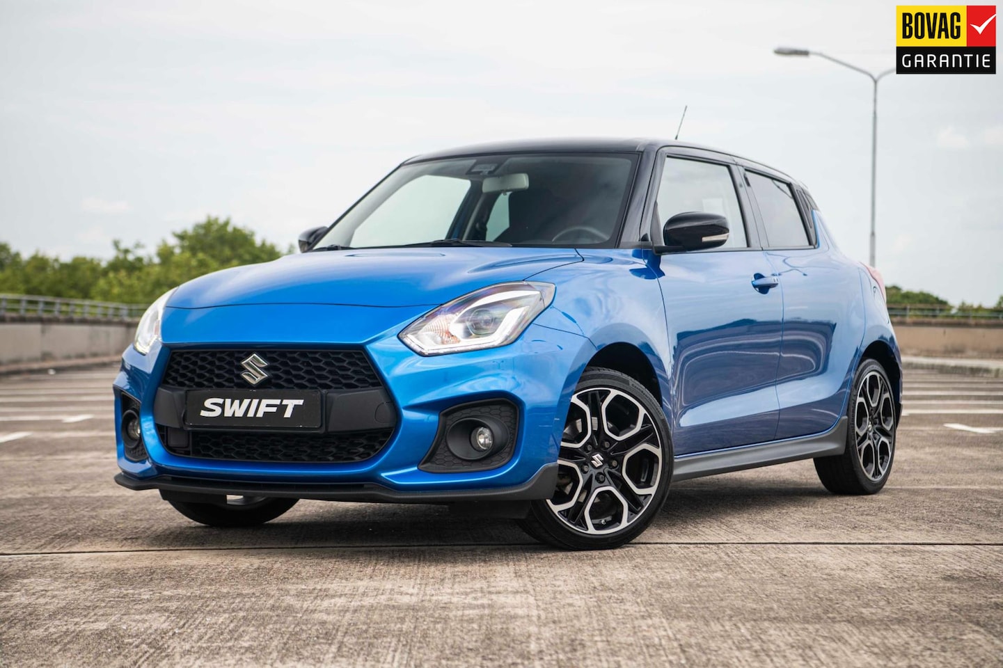 Suzuki Swift - 1.4 Sport Smart Hybrid | Airco/Clima | Achteruitrijcamera | Adaptive Cruise Control | Stoe - AutoWereld.nl