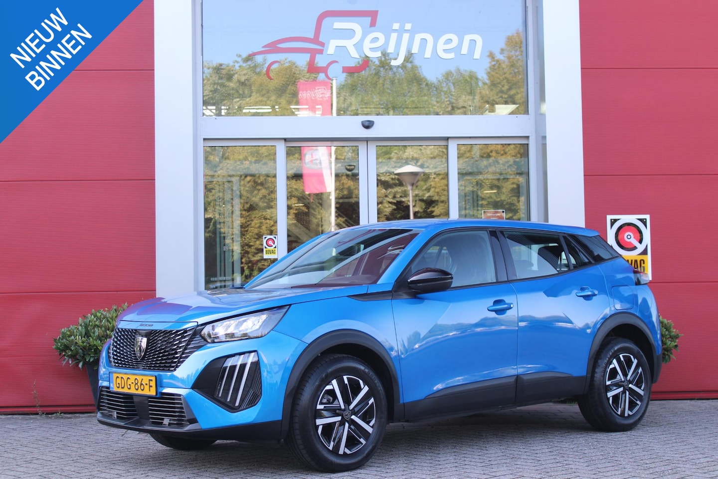 Peugeot 2008 - 1.2 100PK STYLE | DRAADLOZE APPLE CARPLAY/ANDROID AUTO | TREKHAAK | CLIMATE CONTROL | LICH - AutoWereld.nl