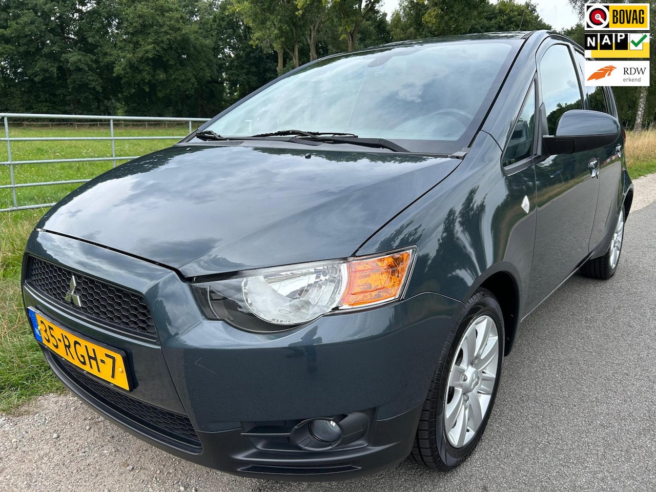 Mitsubishi Colt - 1.3 Edition Two dealer ond. airco cruise control - AutoWereld.nl