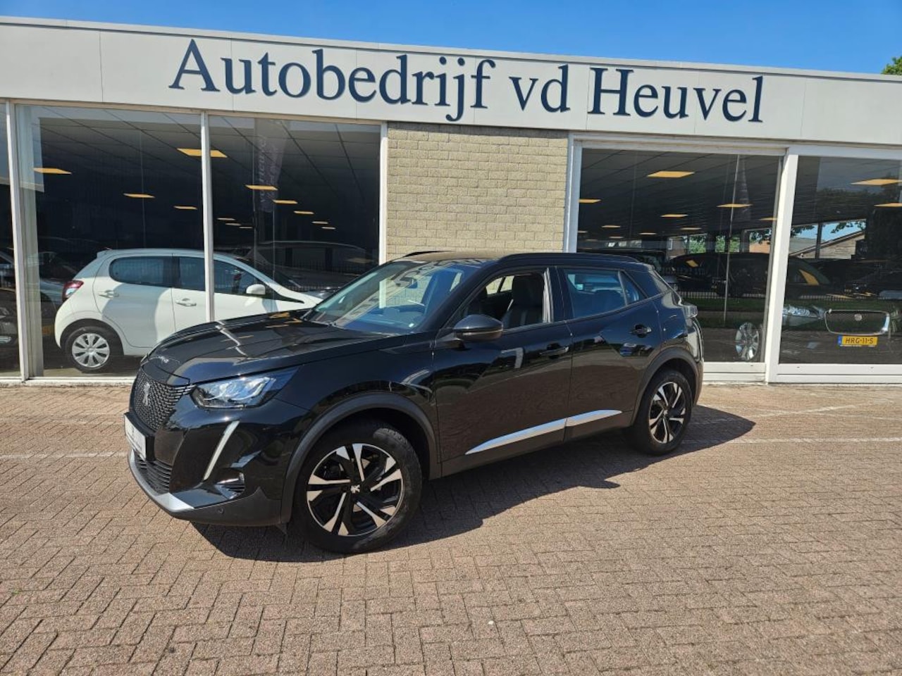 Peugeot 2008 - 1.2 PureTech Allure 131PK*Dealer onderhoud*Nieuwe distributie *Camera*Navi*Carplay*Draadlo - AutoWereld.nl