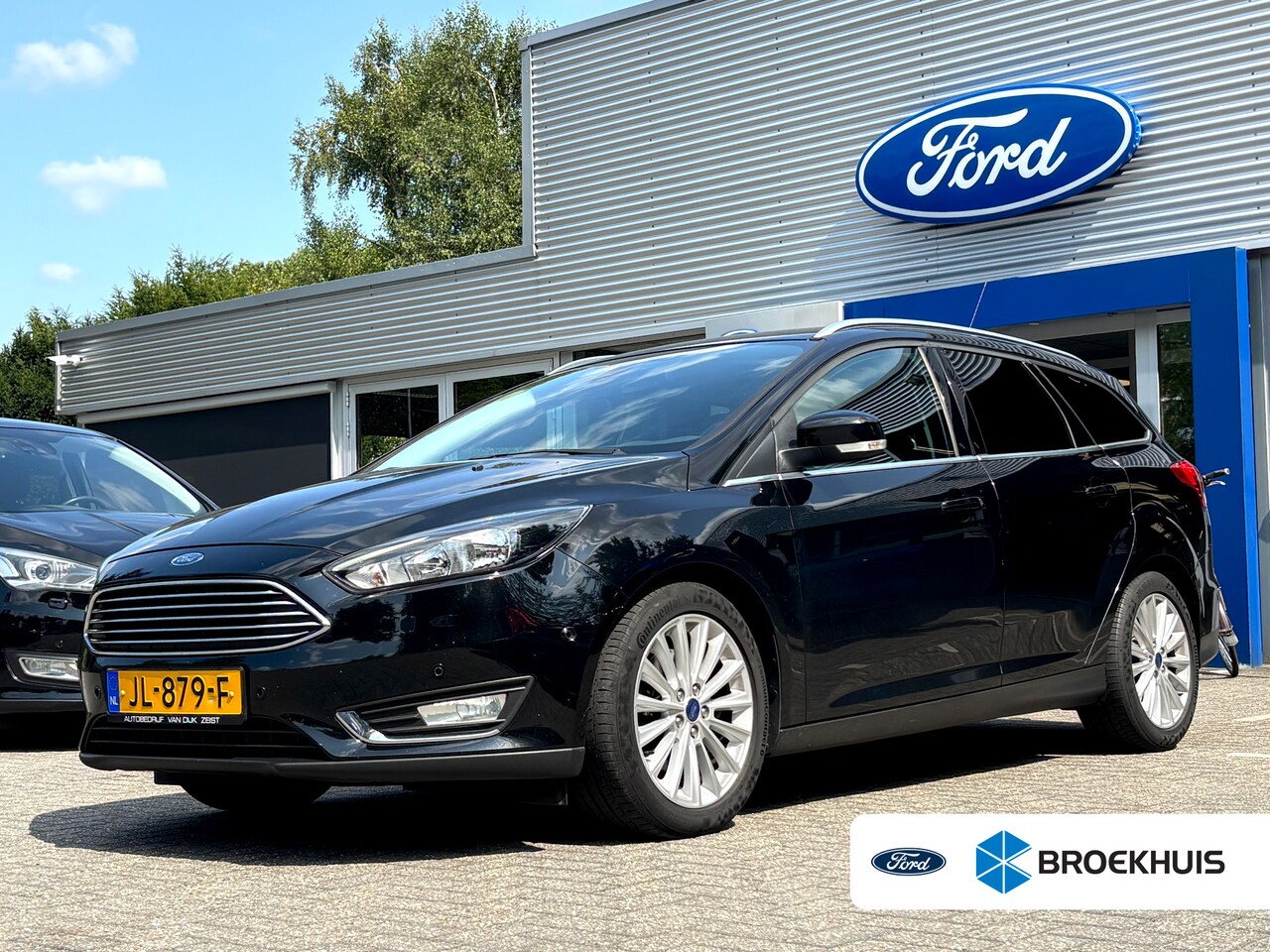 Ford Focus Wagon - 1.5 150PK TITANIUM | NL-AUTO! | TREKHAAK 1500KG | NAVI | CLIMA | CRUISE | VOORRUITVERWARMI - AutoWereld.nl