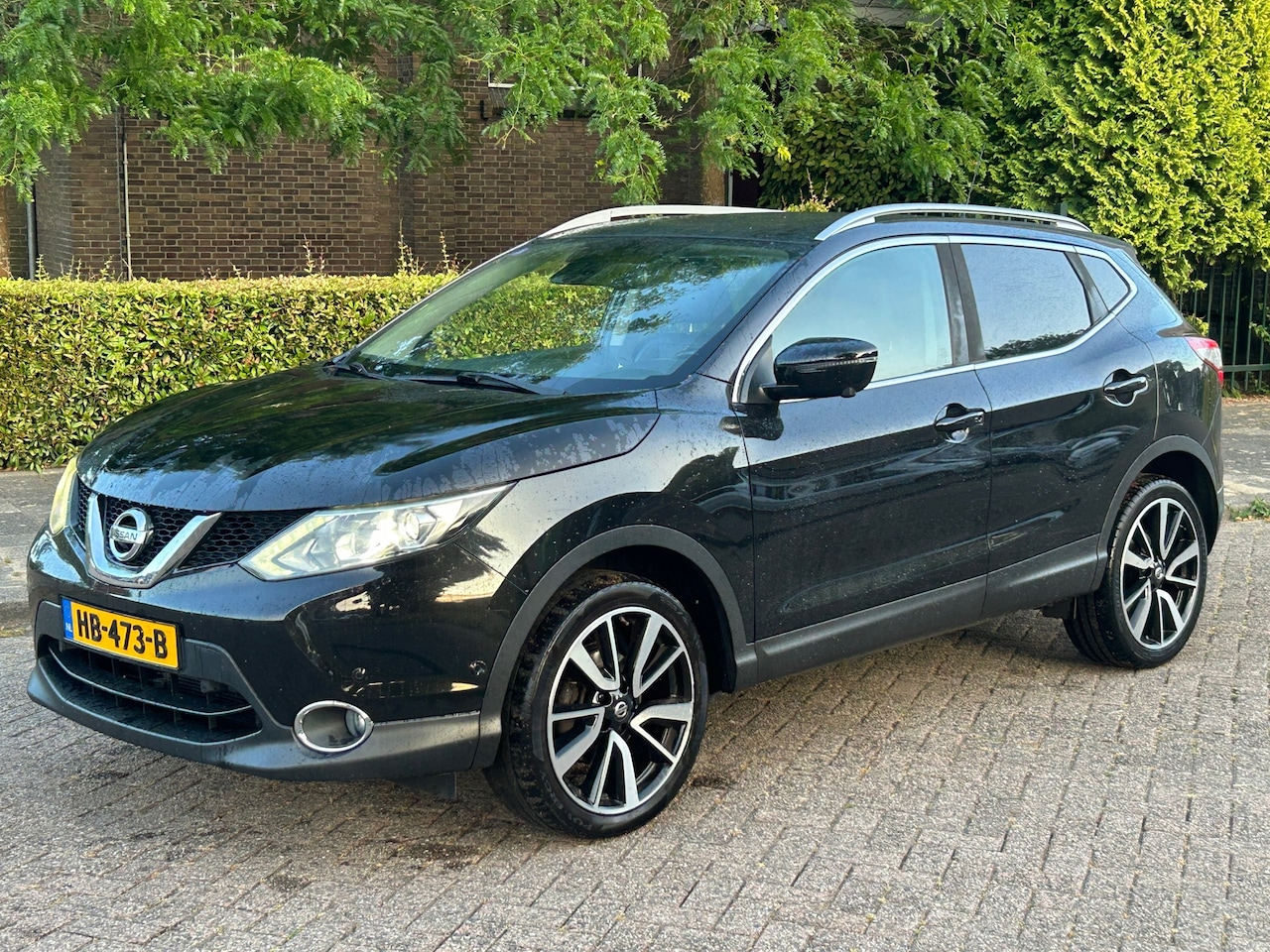 Nissan Qashqai - 1.2 Tekna leer! xenon! led! 360 camera! lane assist! nap! hoge instap! complete auto! - AutoWereld.nl
