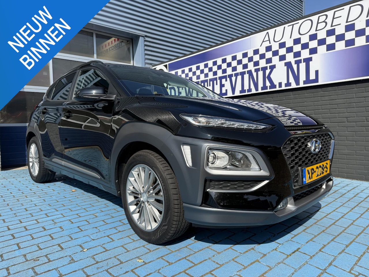 Hyundai Kona - 1.0T CRUISE NAVI P-CAM TREKH ALL SEASON - AutoWereld.nl