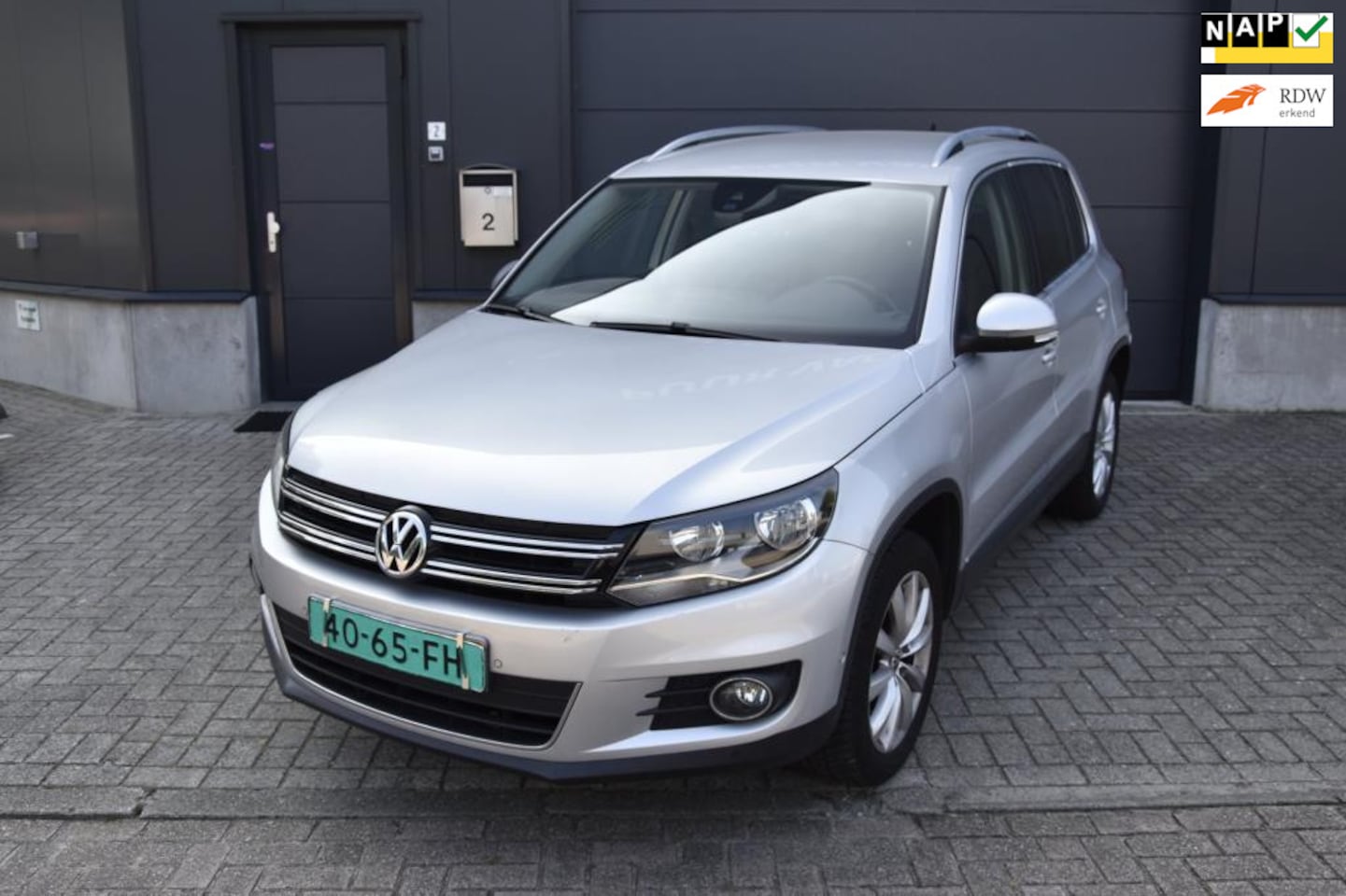 Volkswagen Tiguan - 2.0 TSI Sport&Style 4Motion AUT LEDER NAVI 4x4 inr mog APK 3-26 INCL BTW - AutoWereld.nl