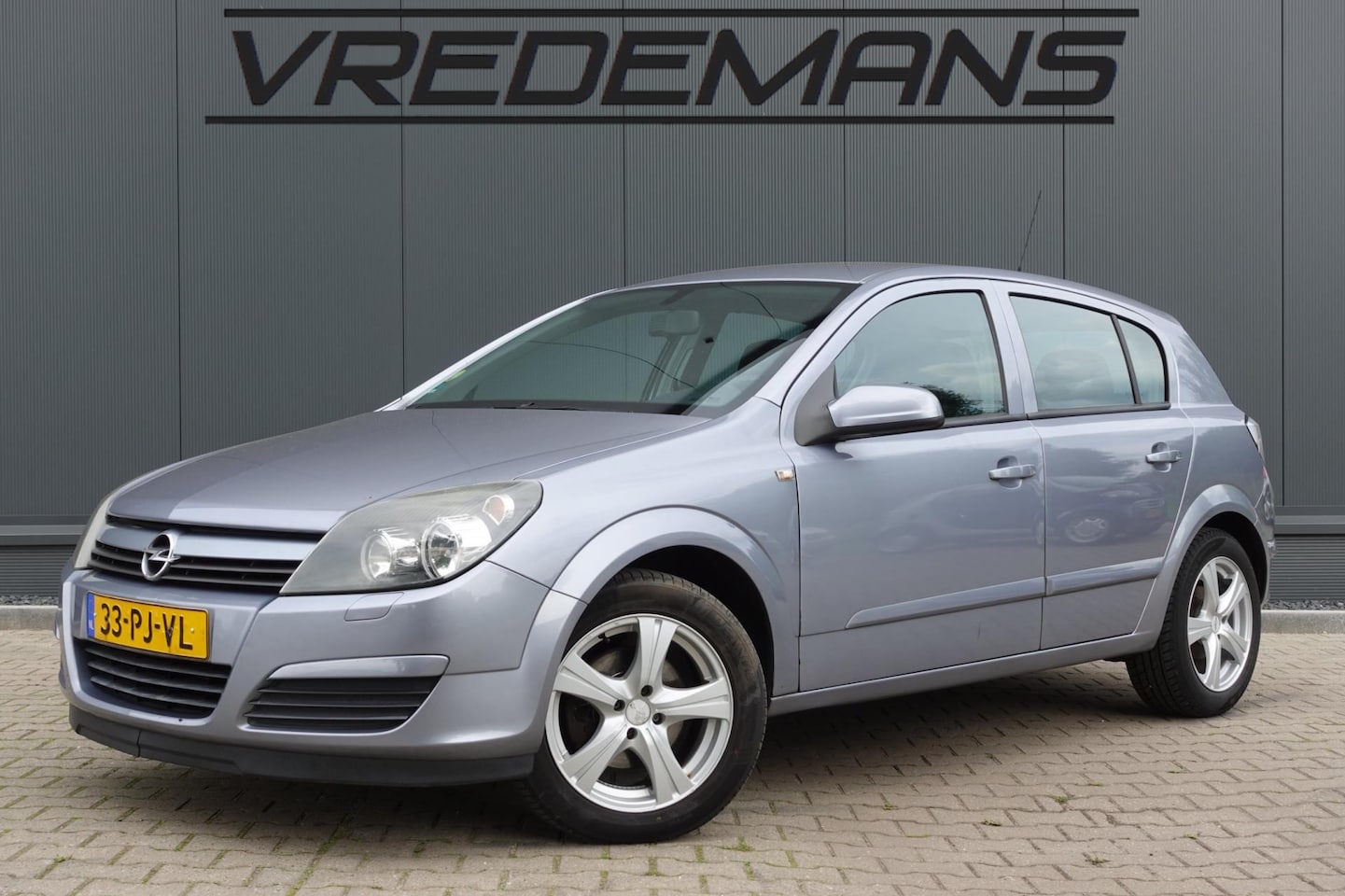 Opel Astra - 1.6 Enjoy AUTOMAAT - AutoWereld.nl