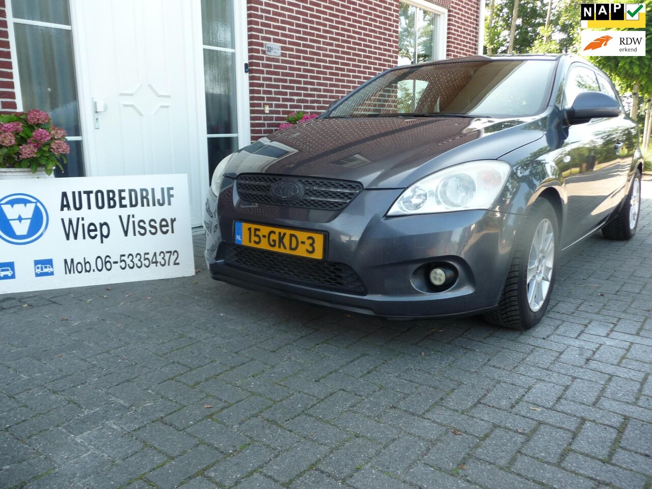 Kia Pro cee'd - 1.4 Challenge seadan coupe leder - AutoWereld.nl