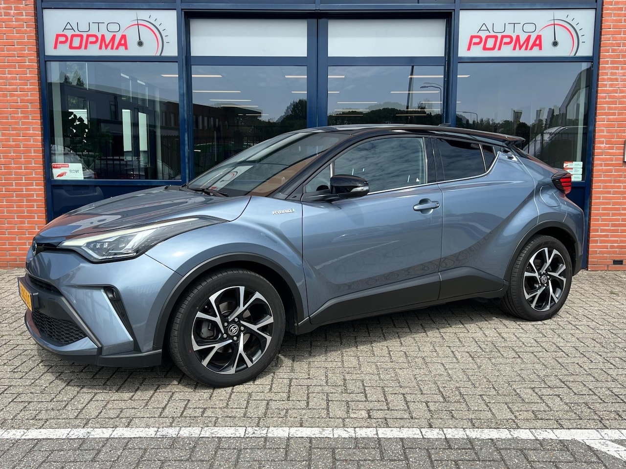 Toyota C-HR - 1.8 Hybrid Business Plus Automaat / Keyless / Two Tone / Navi / Camera / 18" LM / BTW / co - AutoWereld.nl