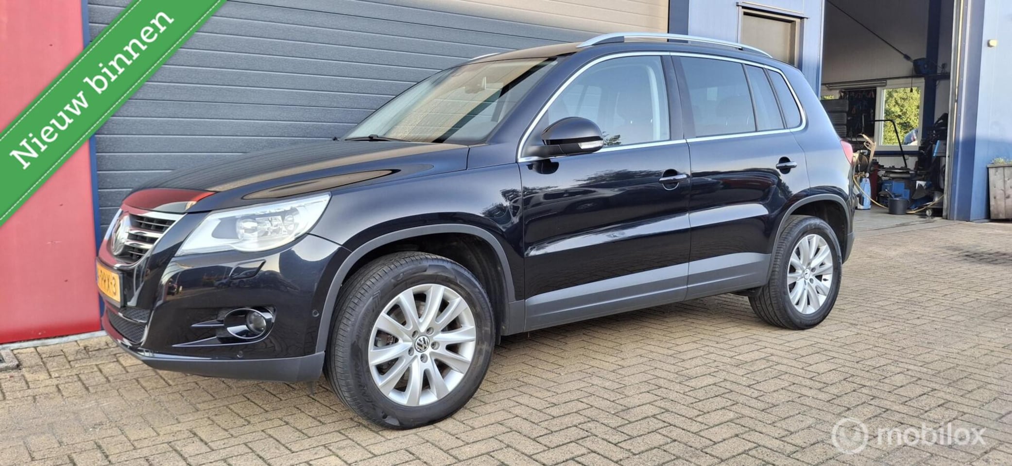 Volkswagen Tiguan - 1.4 TSI, Leer,Camera,Stoelverw,Trekhaak,Xenon - AutoWereld.nl