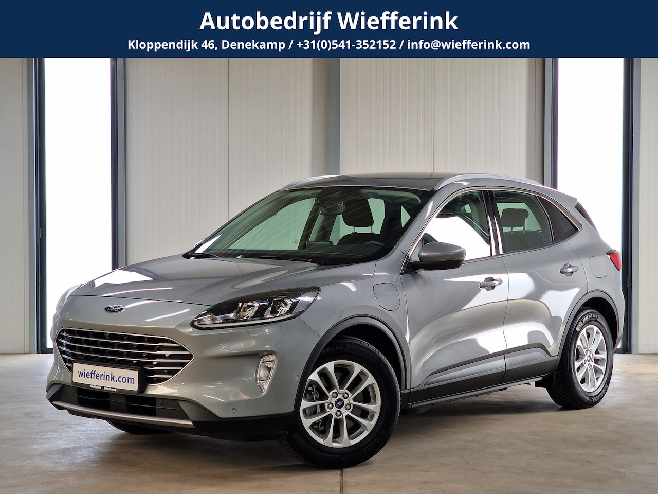 Ford Kuga - 2.5 PHEV Titanium 225 PK | Acc | Winter Assistance pack | Camera | - AutoWereld.nl