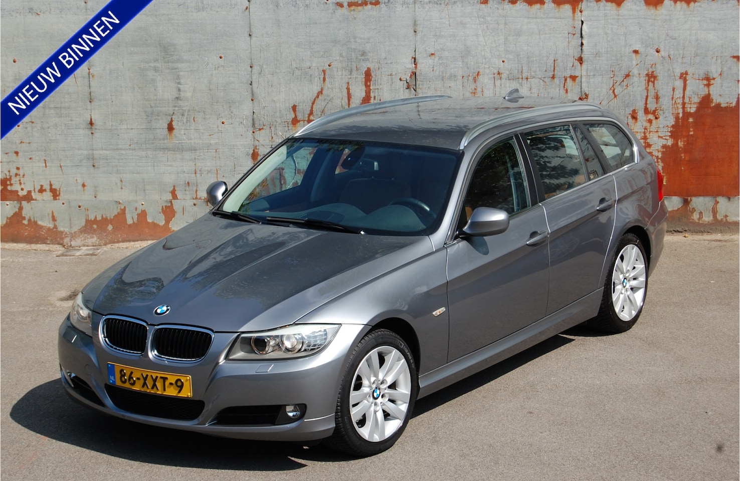 BMW 3-serie Touring - 318i Luxury Line / Navi / Leder / Xenon / 144DKM! - AutoWereld.nl