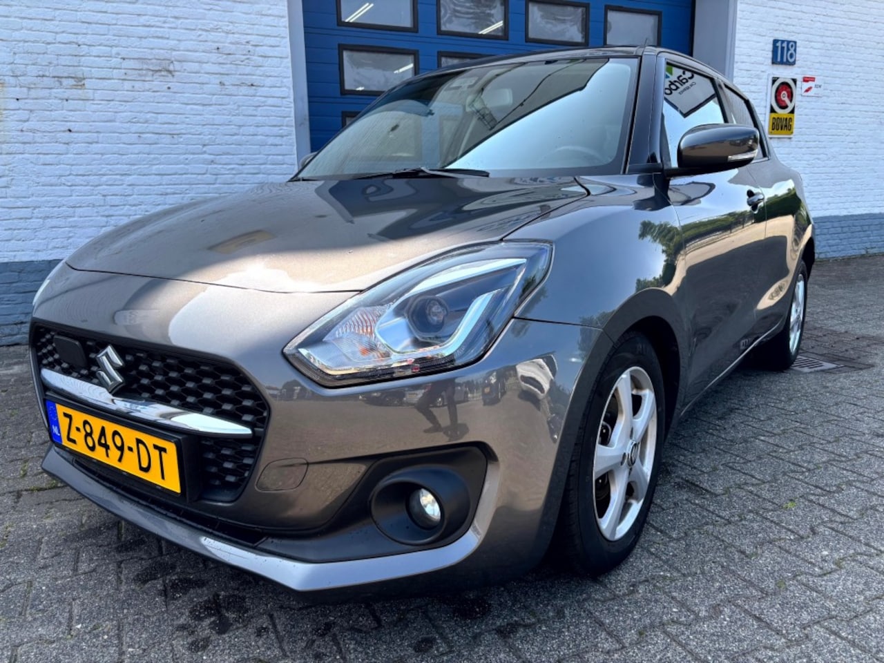 Suzuki Swift - 1.2 STYLE SMARTHYB. - AutoWereld.nl