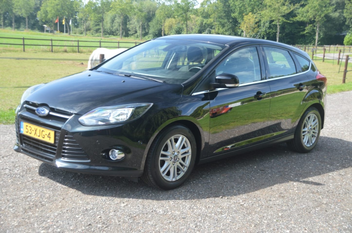 Ford Focus - 1.0 EcoB. Lease Ti. Clima Cruise PDC Trekhaak - AutoWereld.nl