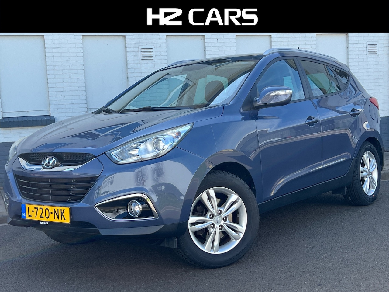 Hyundai ix35 - 2.0i 4WD Business Edition|Automaat|Panodak|Camera - AutoWereld.nl