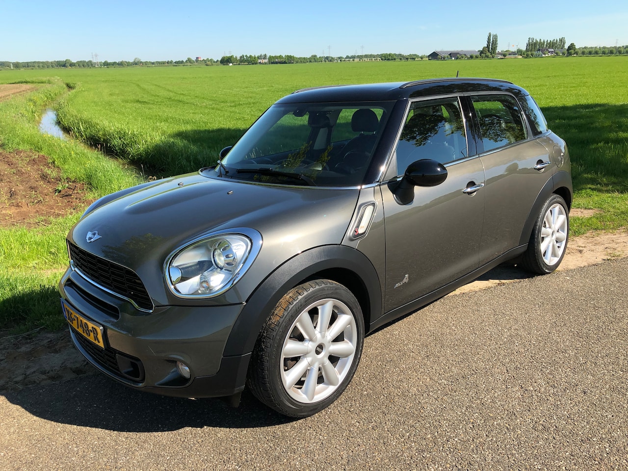 MINI Countryman - 1.6 Cooper S ALL4 Chili lederen bekleding, 18 inch velgen, cruise control, climate control en meer. - AutoWereld.nl