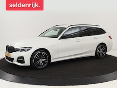 BMW 3-serie Touring - 320e M Sport | Head-Up | LaserLight | Stoelverwarming | Adaptive cruise | Sfeerverlichting