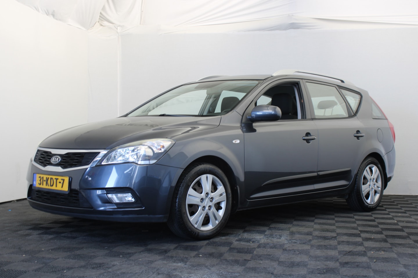 Kia Cee'd Sporty Wagon - 1.6 CVVT X-ecutive 1.6 CVVT X-ecutive - AutoWereld.nl