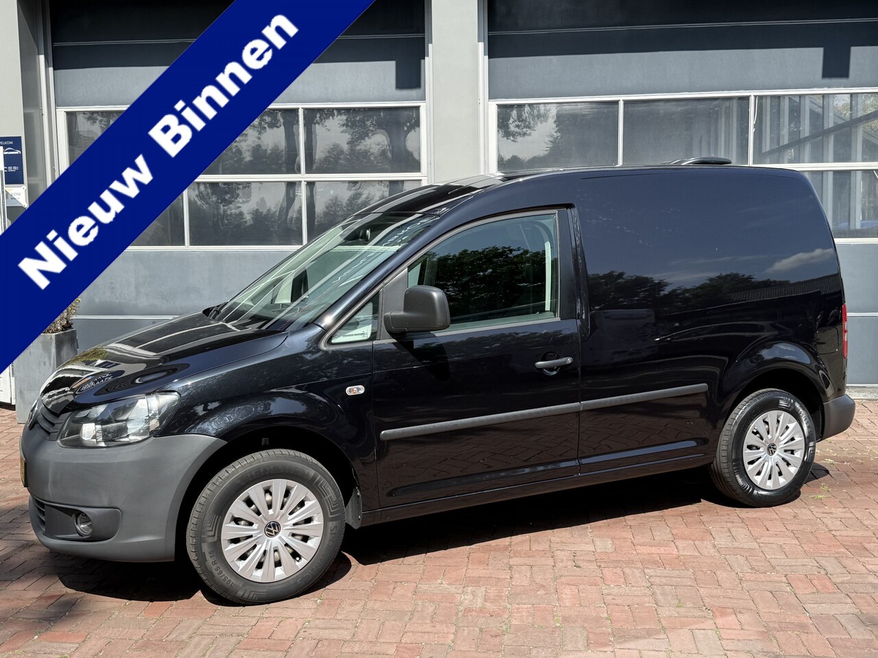 Volkswagen Caddy - 1.6 TDI Bj 2014 Apk 02-2026 75pk Navi,Trekhaak,Cv,Cruise - AutoWereld.nl