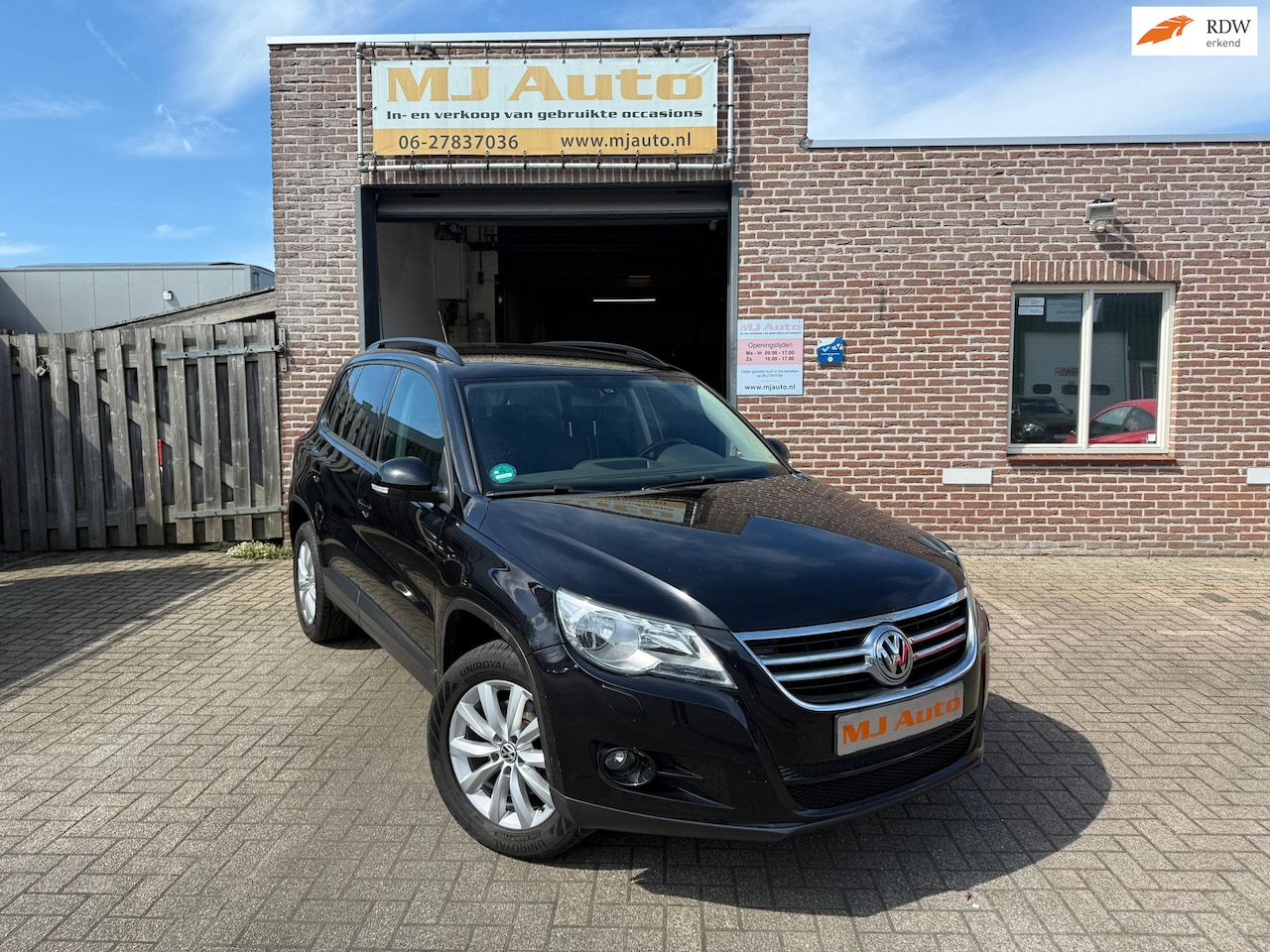Volkswagen Tiguan - 1.4 TSI Sport&Style airco cruise control stoelverwarming - AutoWereld.nl