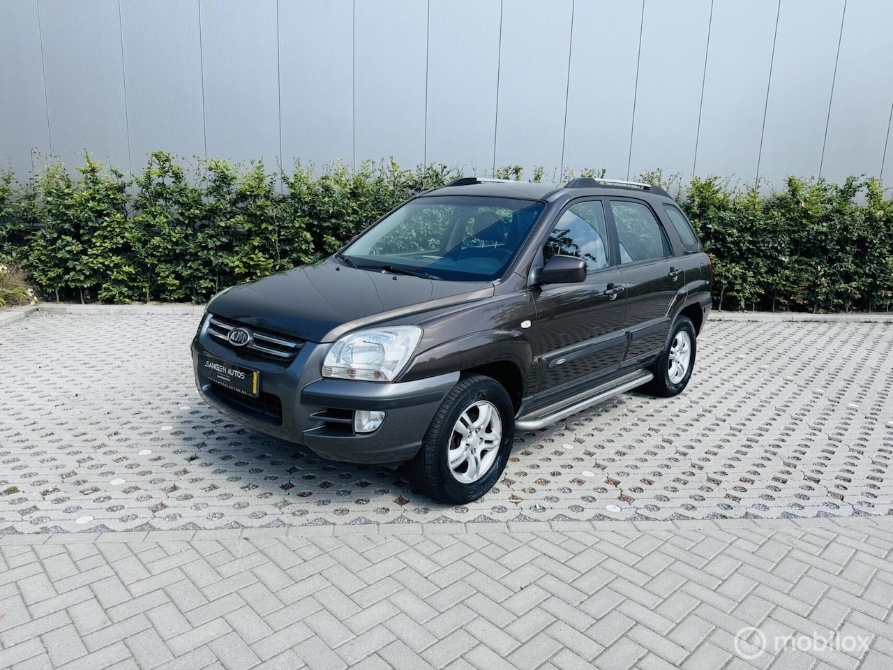 Kia Sportage - 2.0 CVVT X-ecutive 2.0 CVVT X-ecutive - AutoWereld.nl