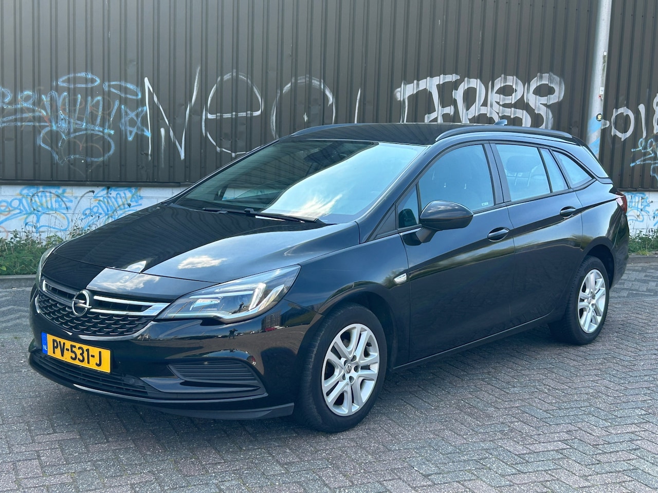 Opel Astra Sports Tourer - 1.0 Online Edition 2017 Carplay! PDC v+a! NAP! Led! Cruise control! Start/stop! Zuinig! - AutoWereld.nl