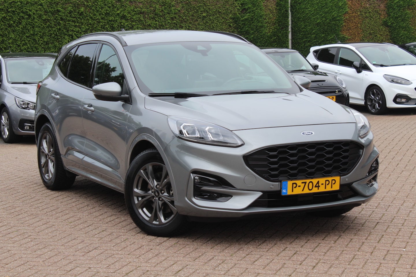 Ford Kuga - 2.5 PHEV ST-Line X / Head-up / Keyless / Leder&Alcantara / 18'' / Navigatie / Parkeerhulp - AutoWereld.nl