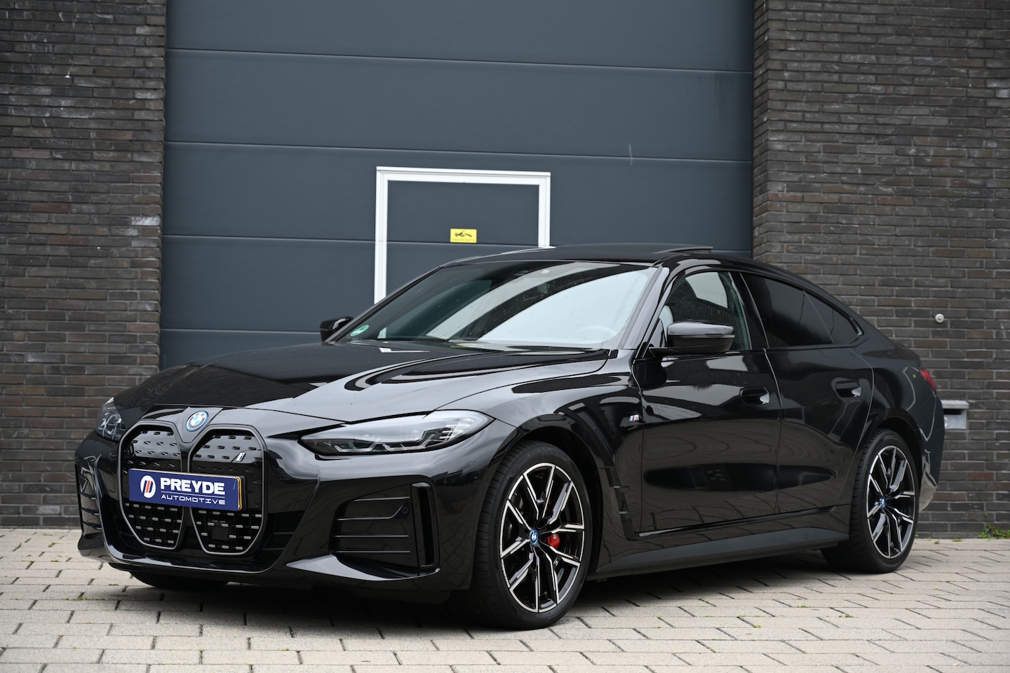 BMW i4 - eDrive40 High Executive 84 kWh M Sport Pro, Schuifdak, Premium Audio - AutoWereld.nl