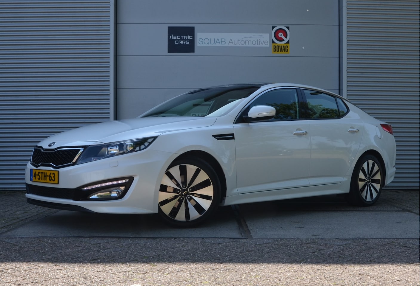 Kia Optima - 2.0 CVVT Hybrid Super Pack Pano, 17" alu, Clima, Leder - AutoWereld.nl
