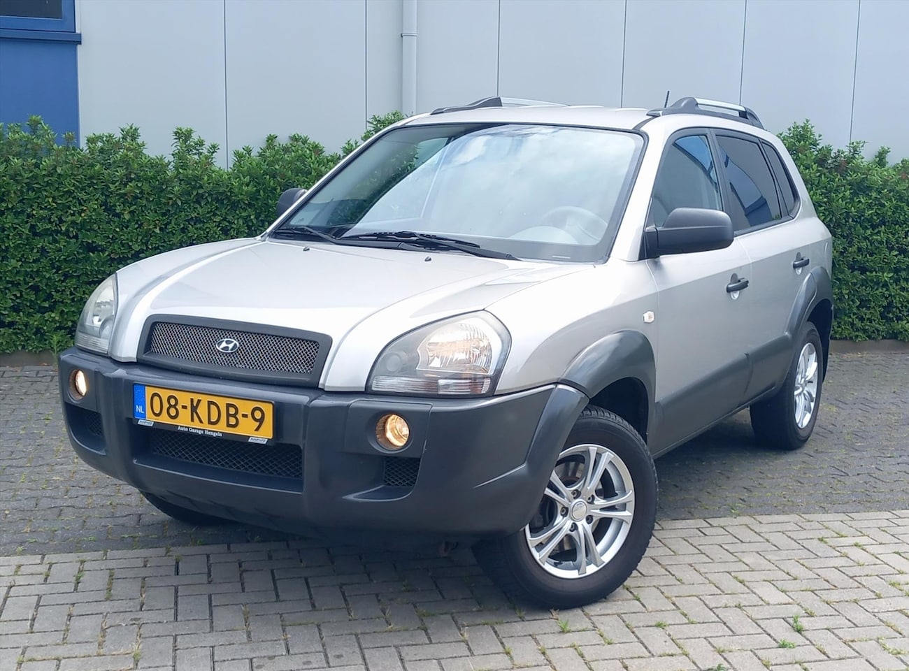 Hyundai Tucson - 2.0 I 2WD Dynamic Airco/Trekhaak - AutoWereld.nl