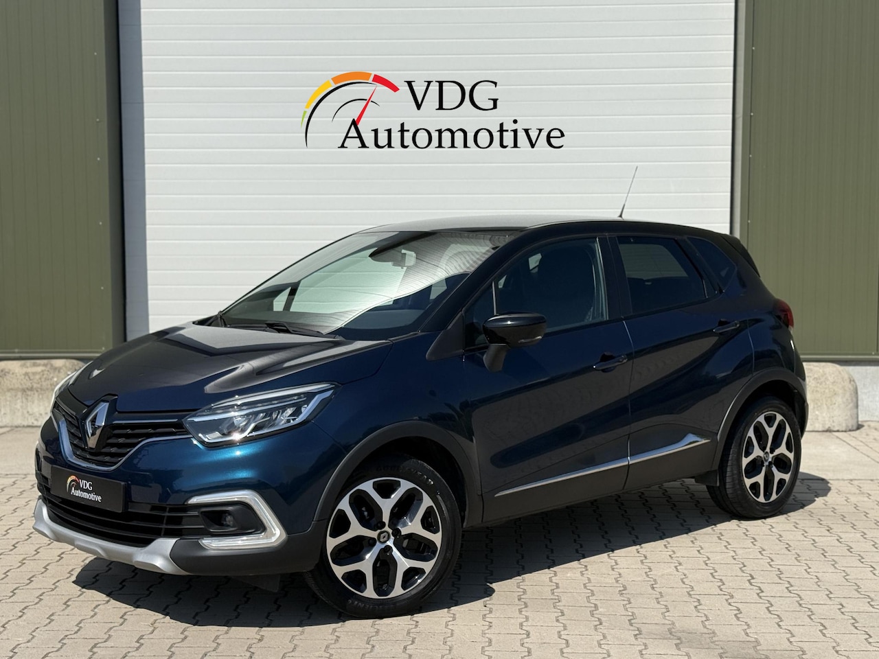 Renault Captur - 0.9 TCe 90 Intens / Clima / Navi / 17" lm / Cruise / Donker glas - AutoWereld.nl