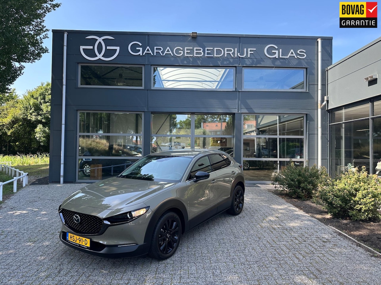 Mazda CX-30 - 2.0 e-SkyActiv-G M Hybrid Nagisa (zircon sand) - AutoWereld.nl
