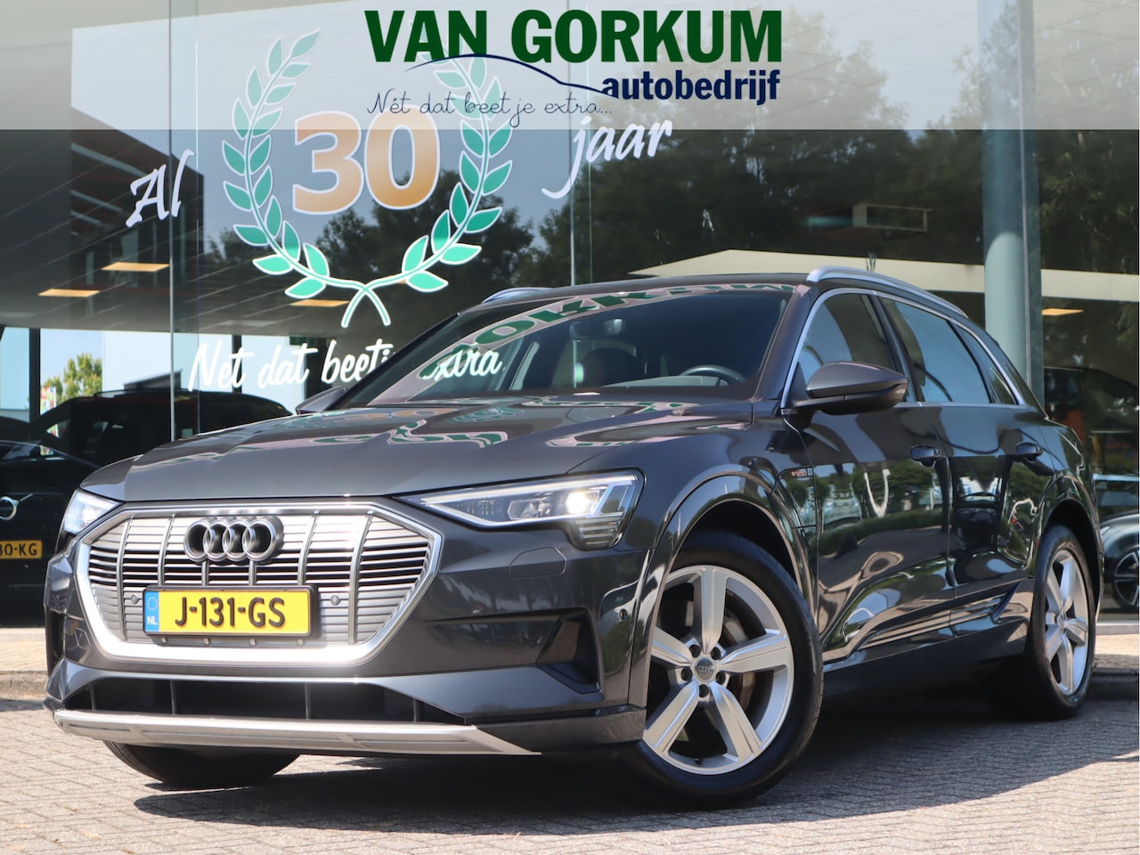 Audi e-tron - 50 quattro Business edition Plus 71 kWh / Panoramadak / Sportstoelen - AutoWereld.nl