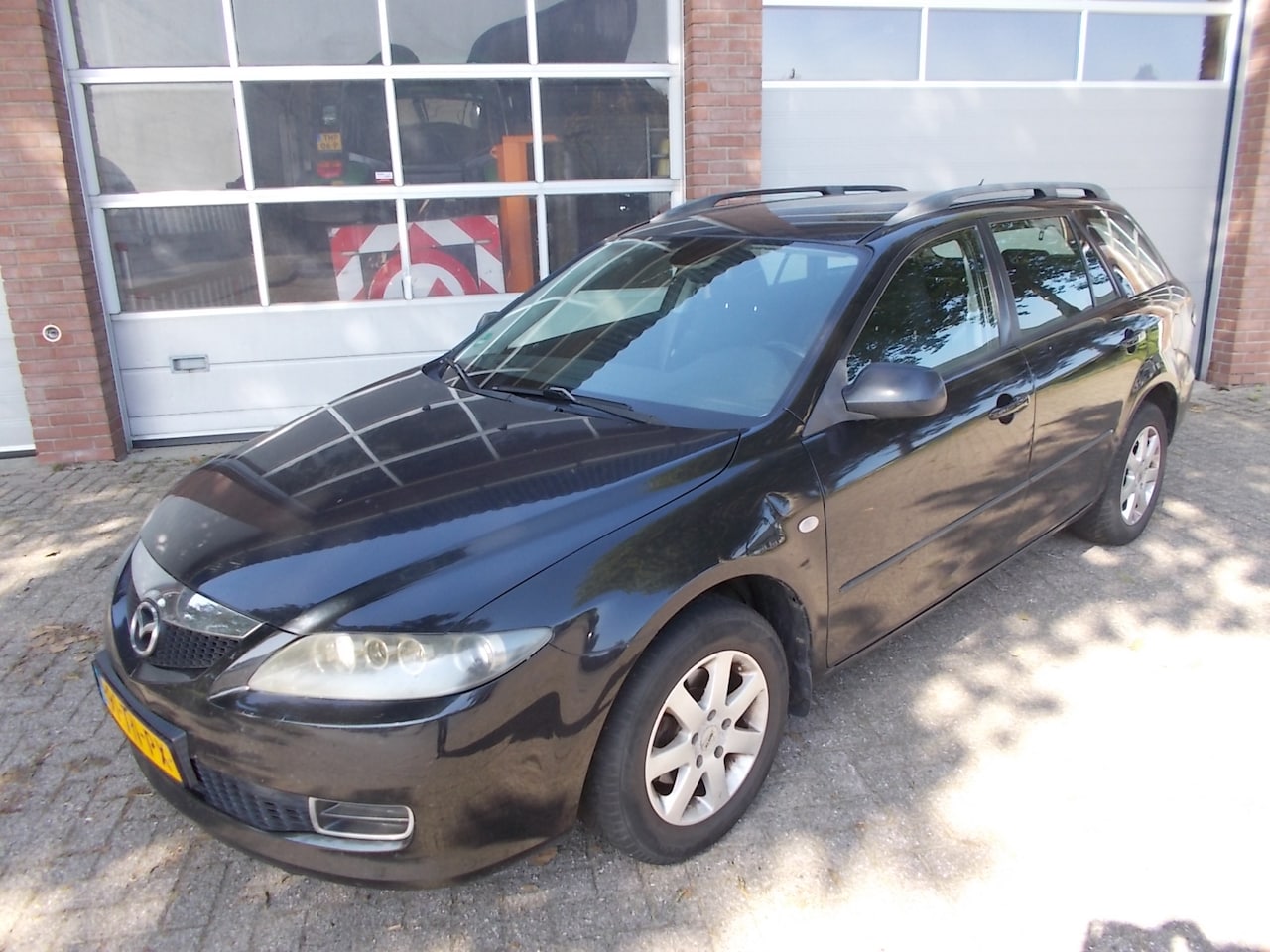 Mazda 6 Sportbreak - 1.8i Touring 1.8i Touring ( APK 16-03-2026 ) - AutoWereld.nl