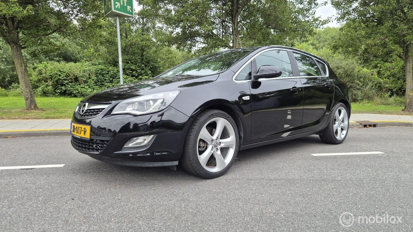 Opel Astra - 1.6 Turbo Cosmo Sport - AutoWereld.nl