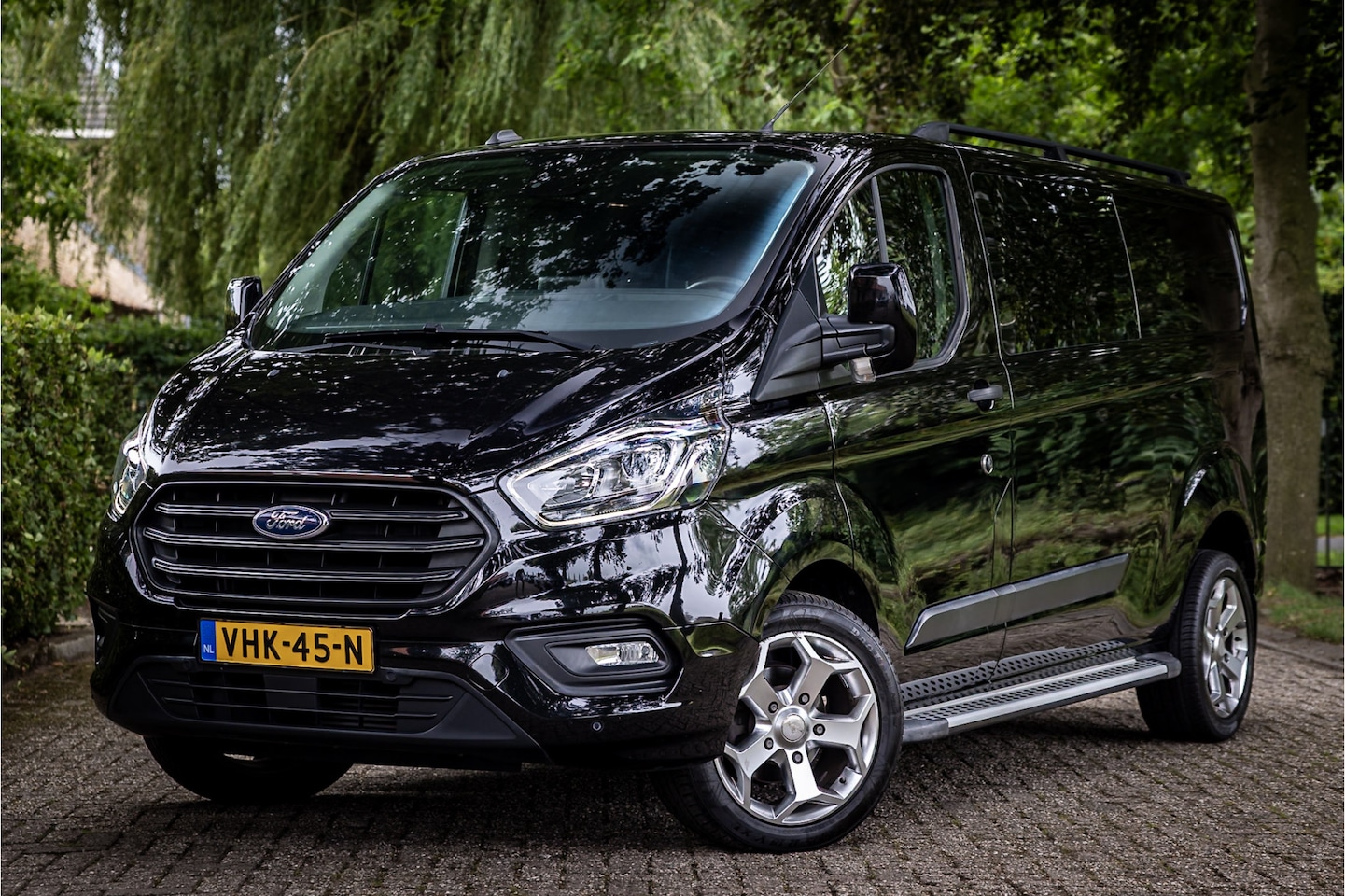 Ford Transit Custom - 320 2.0 TDCI L2H1 Trend DC Dubbele Cabine Navigatie 18" Sidebars - AutoWereld.nl