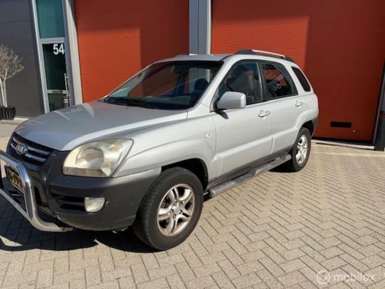 Kia Sportage - 2.0 CVVT Comfort 2.0 CVVT Comfort - AutoWereld.nl