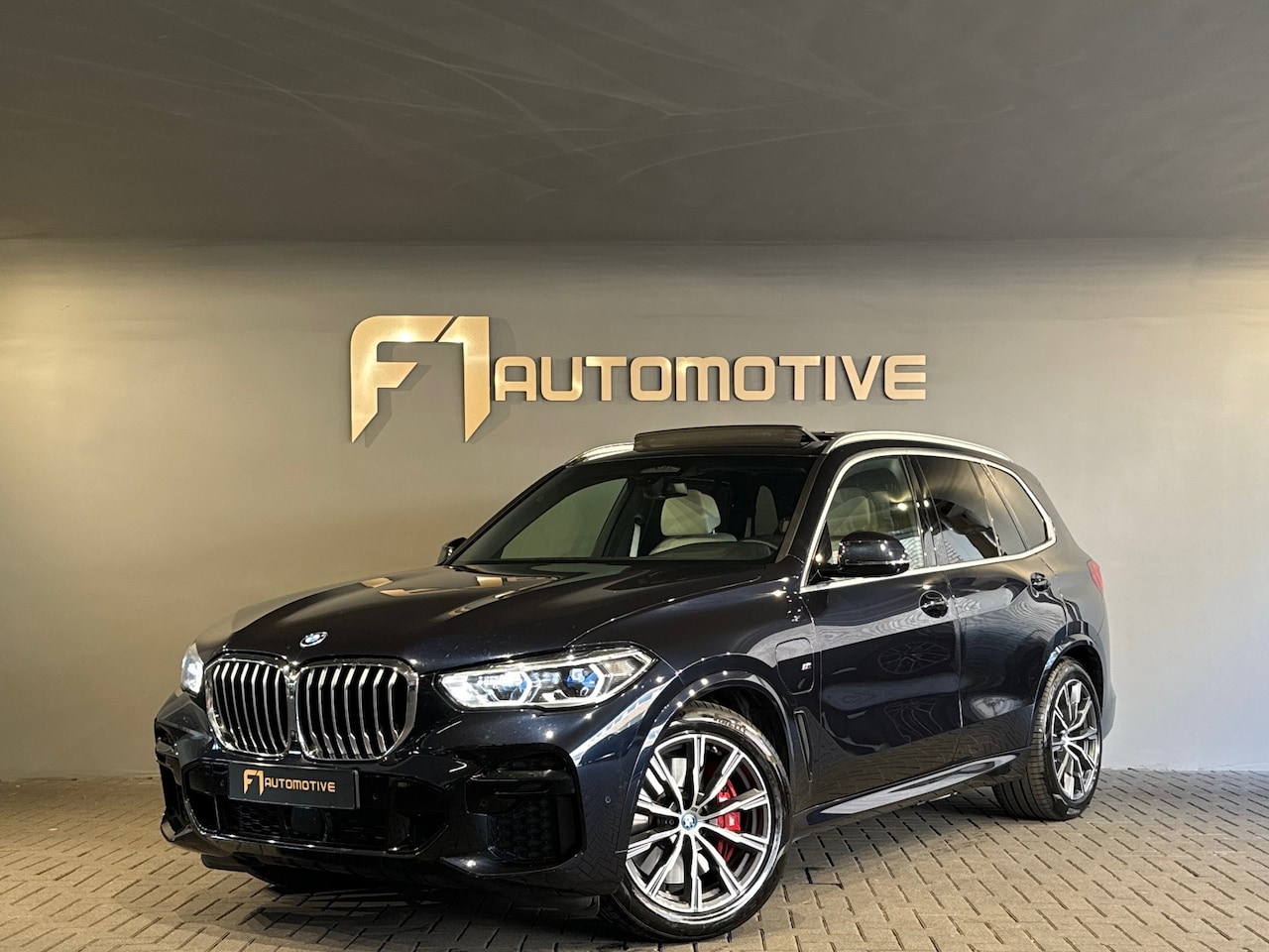 BMW X5 - XDrive45e High Executive M Sport Pano|HuD|keyl|Trekhaak - AutoWereld.nl
