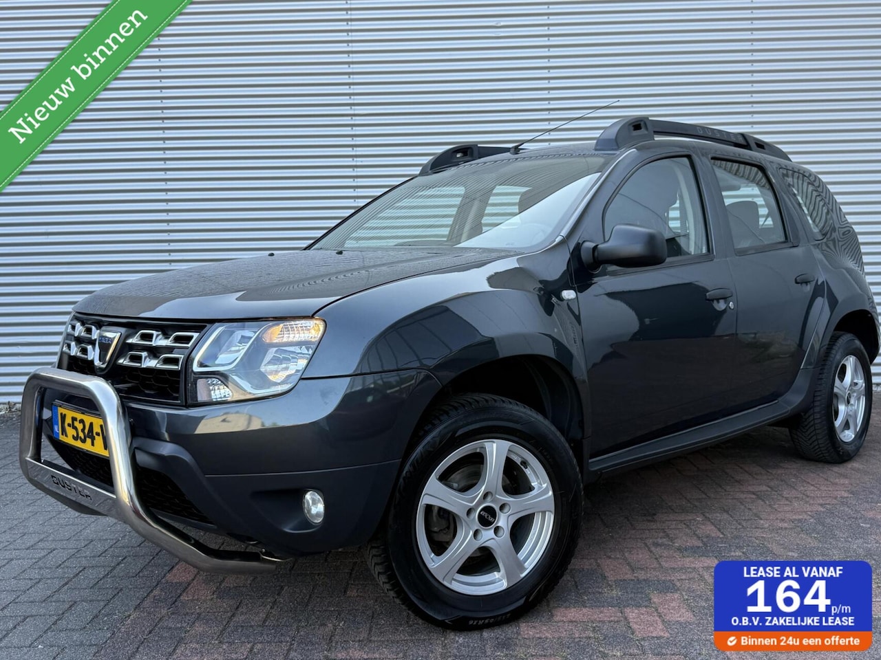 Dacia Duster - 1.6 SCe 4x2 Aux Trekhaak Eerste Eigenaar Pdc 18 - AutoWereld.nl