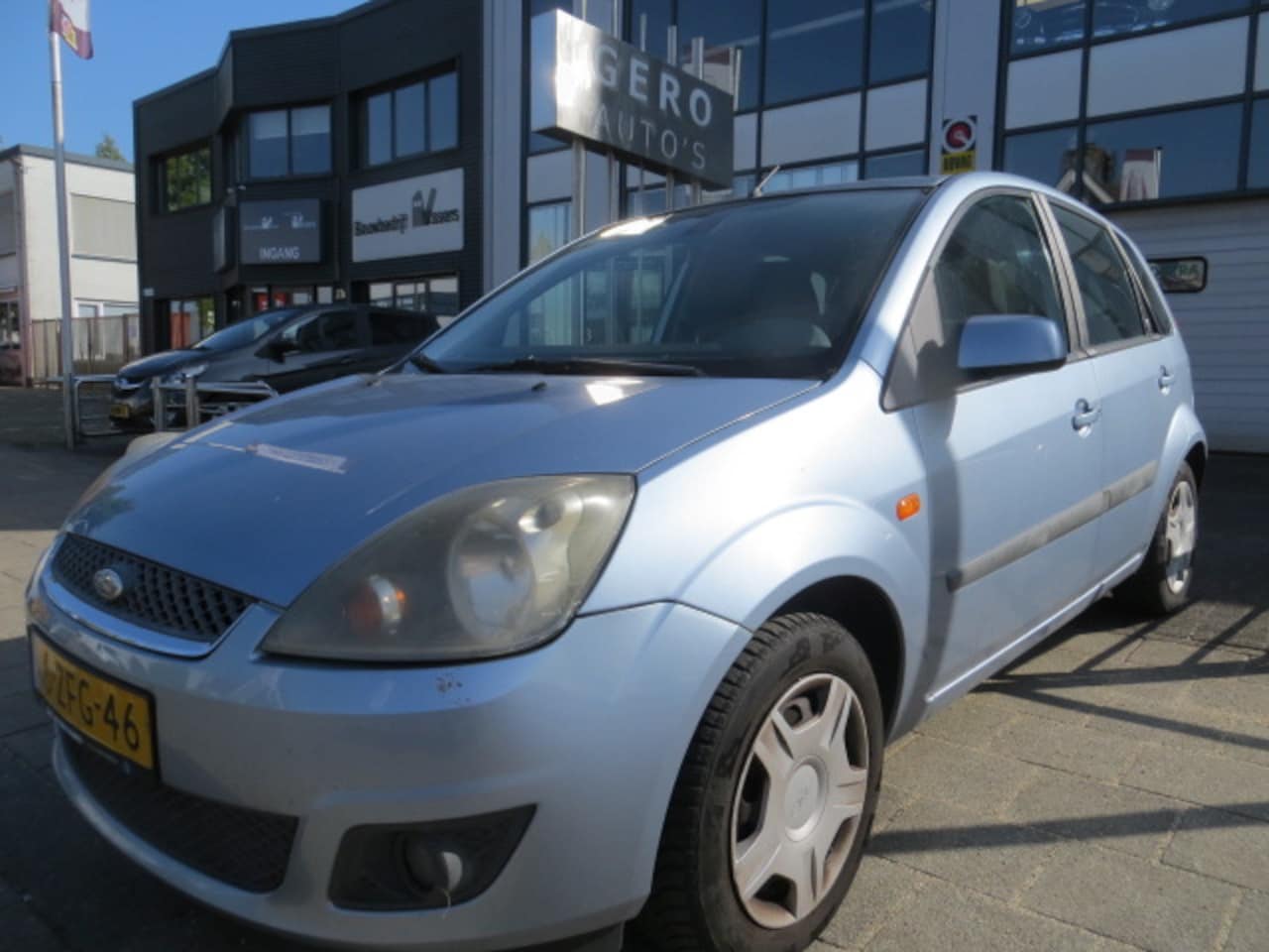 Ford Fiesta - 1.4-16V Ambiente 5 drs nw apk airco elec ramen - AutoWereld.nl