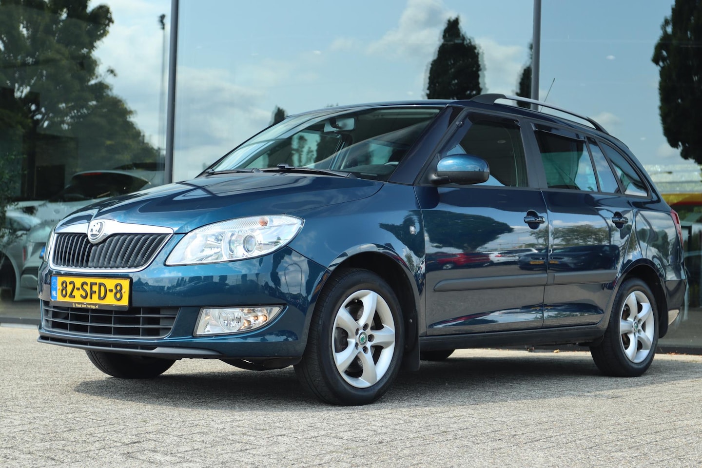 Skoda Fabia Combi - 1.2 TSI GREENTECH TOUR | CRUISE | AIRCO | TREKHAAK | PDC - AutoWereld.nl