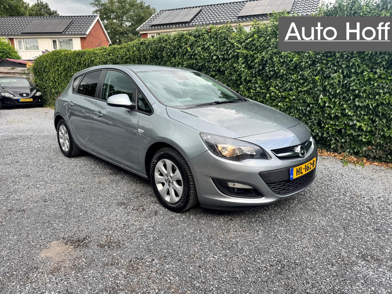 Opel Astra - 1.4 Blitz | Navi | Airco | Cruise Control | LMV | PDC | Trekhaak | Privacy Glass | APK tot - AutoWereld.nl