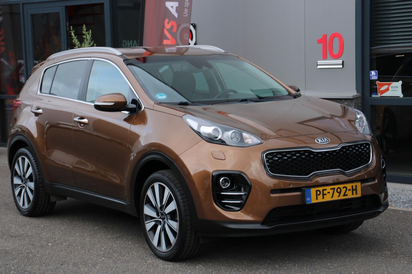 Kia Sportage - 1.6 GDI ExecutiveLine LEER, NAVI, TREKHAAK, WINTERPAKKET - AutoWereld.nl