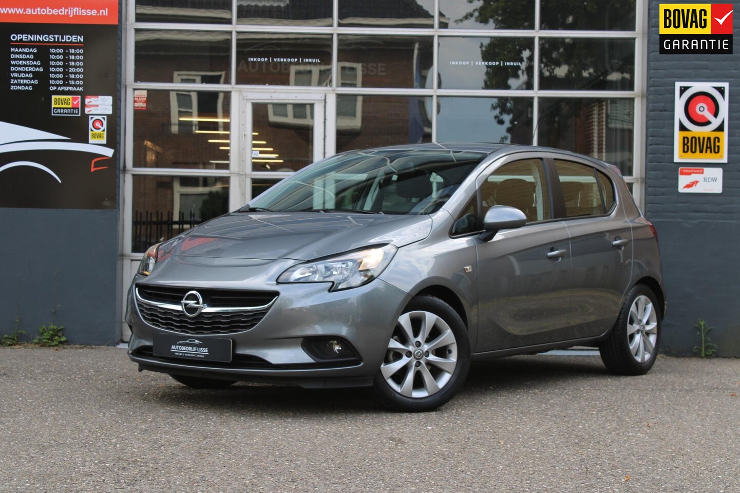 Opel Corsa - 1.4 Favourite Airco Navi PDC Apple Carplay Nap - AutoWereld.nl