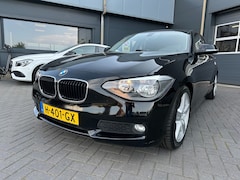 BMW 1-serie - Business+ met airco, cruise control, PDC