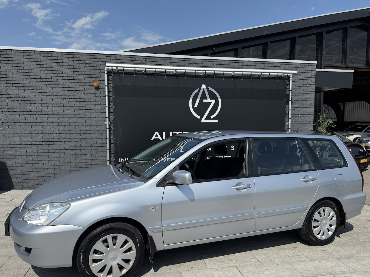 Mitsubishi Lancer Station Wagon - 1.6 Inform AIRCO KOUD !! - AutoWereld.nl