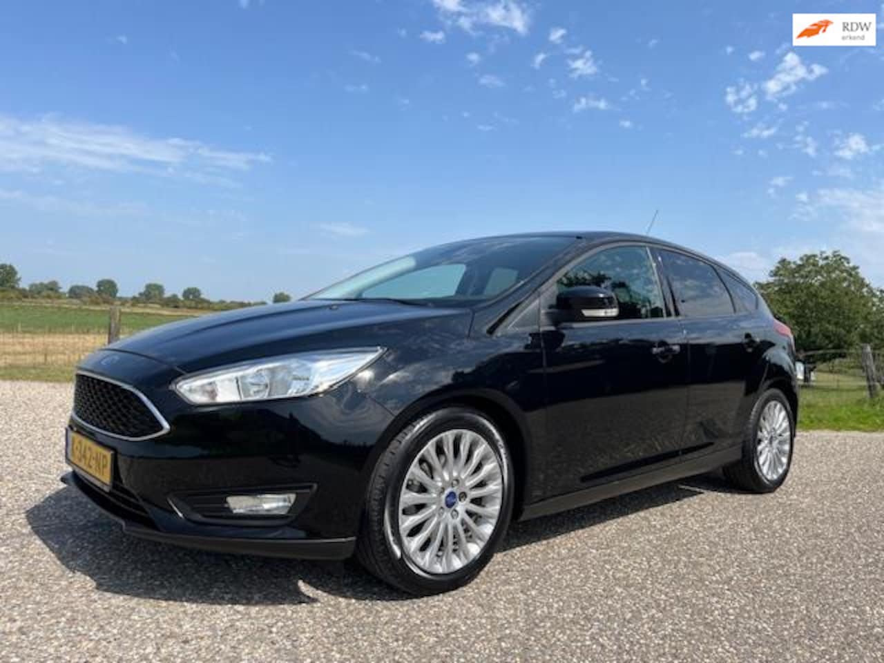 Ford Focus - 1.0 Titanium Edition 5drs Airco 143787 km bj 2015 - AutoWereld.nl